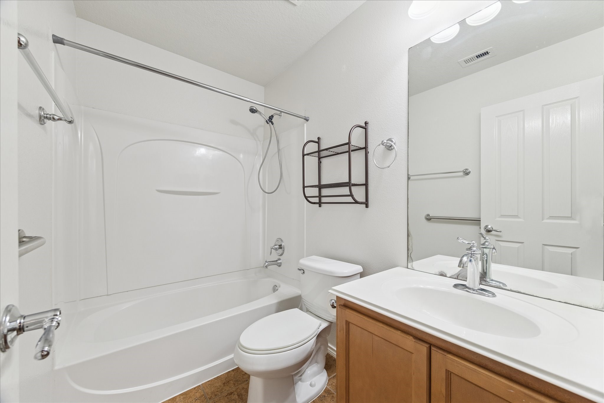 1034 Clover Leaf Court Rosenberg, TX 77469 - Photo 18 of 21 a bathroom with a sink toilet and shower