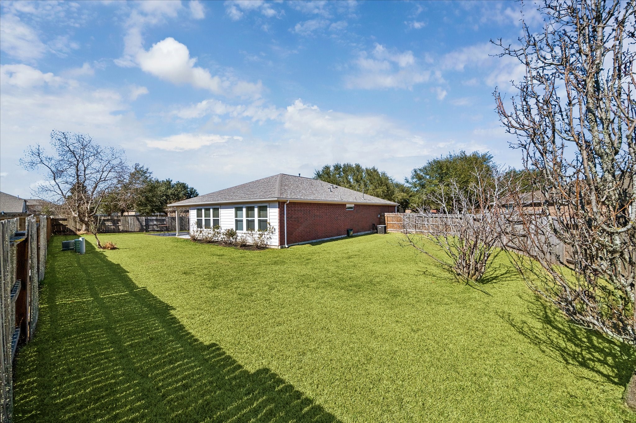 1034 Clover Leaf Court Rosenberg, TX 77469 - Photo 19 of 21 a view of an house with backyard and garden