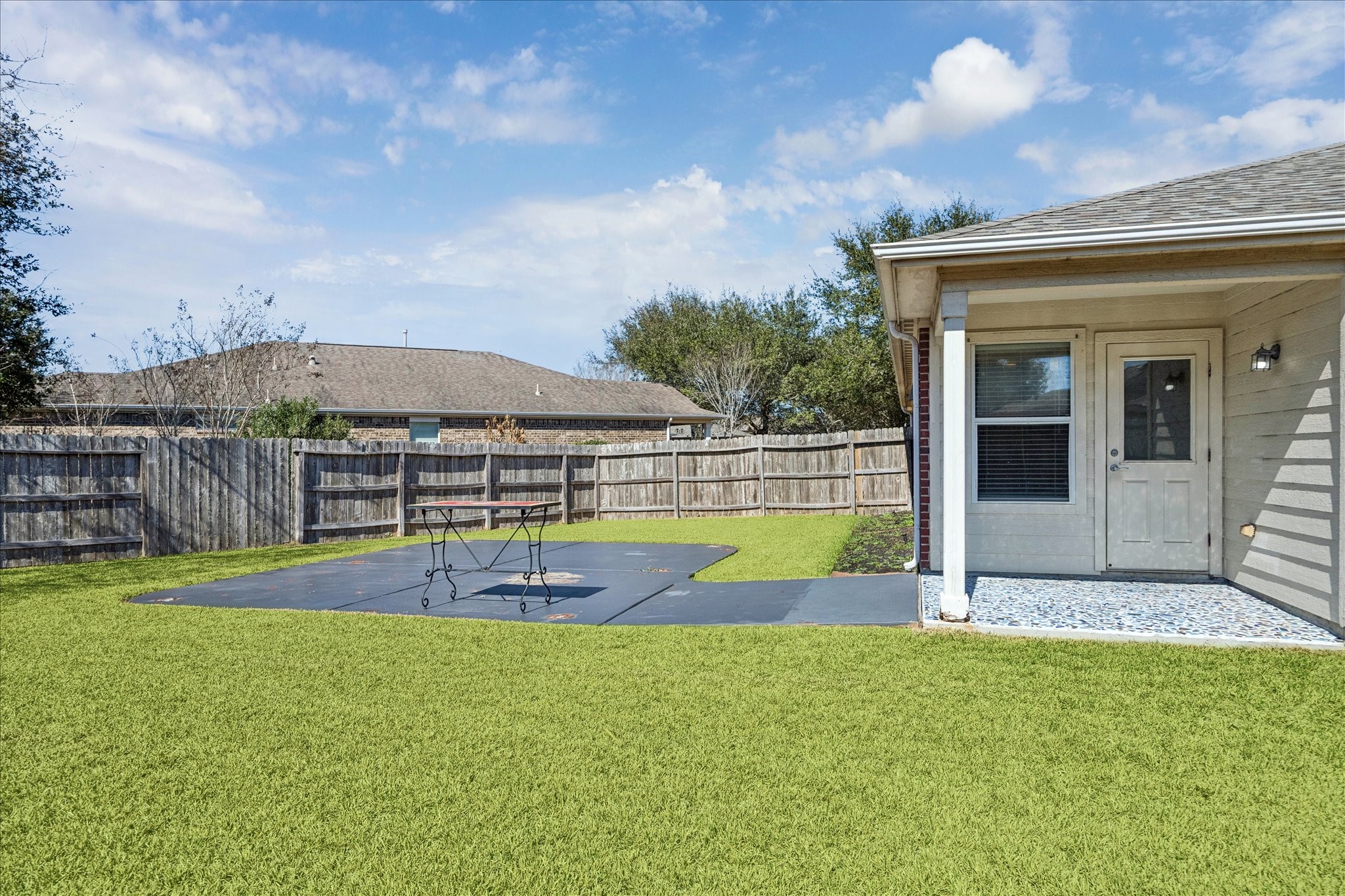 1034 Clover Leaf Court Rosenberg, TX 77469 - Photo 21 of 21 a view of a house with swimming pool and a yard
