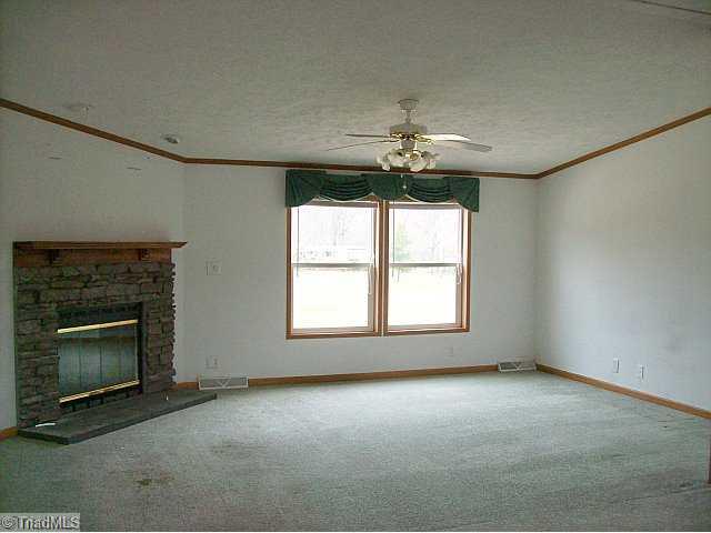 588 Fred Lanier Road Mocksville, NC 27028 - Photo 5 of 12 Living Room. Fireplace in living room