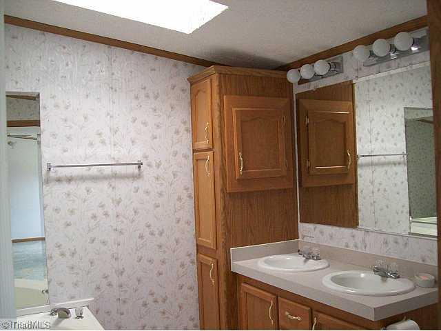 588 Fred Lanier Road Mocksville, NC 27028 - Photo 10 of 12 Master Bath/Spa. Master bath also offers dual vanity and skylight