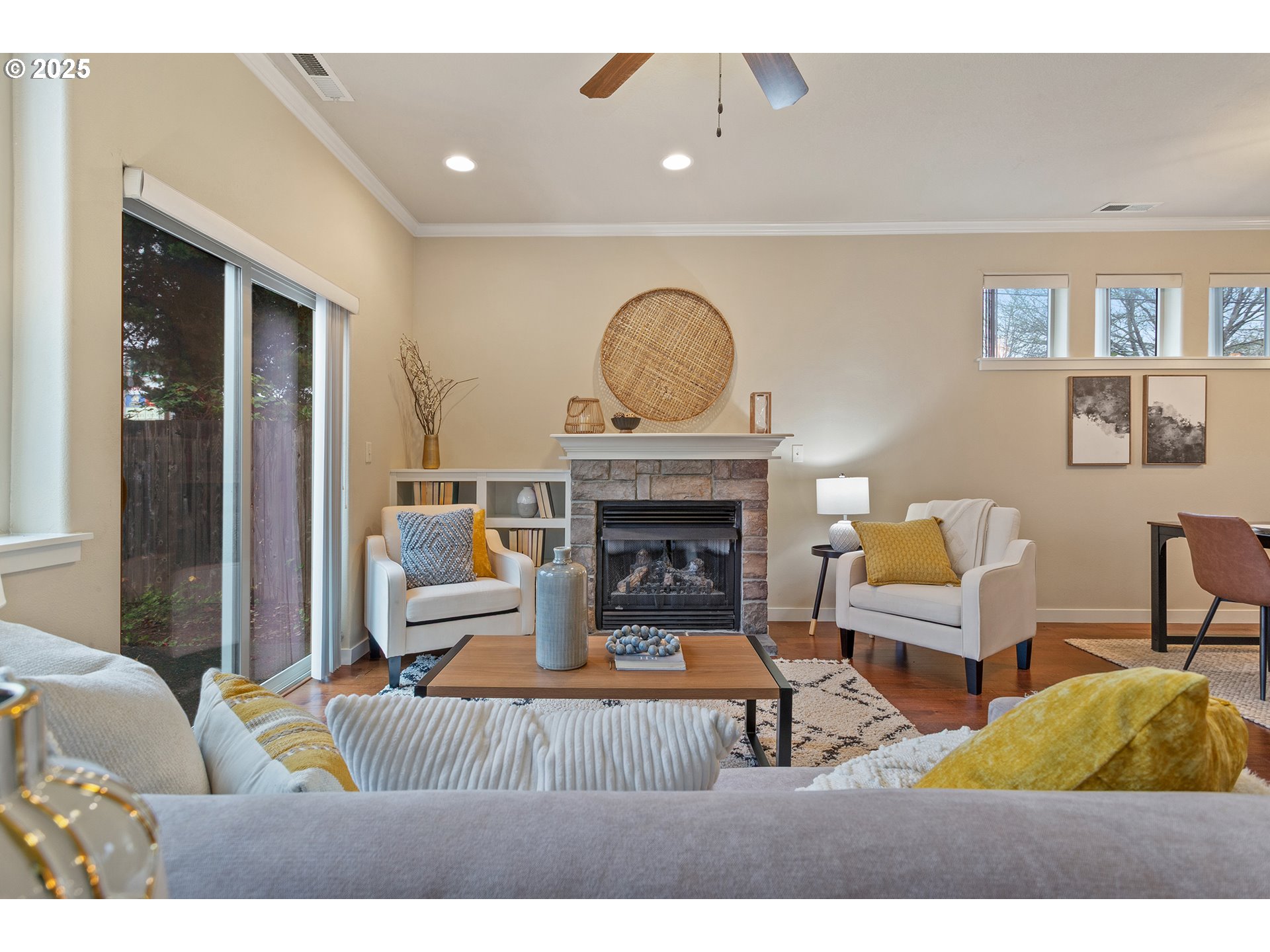 17515 Southwest Vanguard Lane Beaverton, OR 97007 - Photo 13 of 34 a living room with furniture and a fireplace