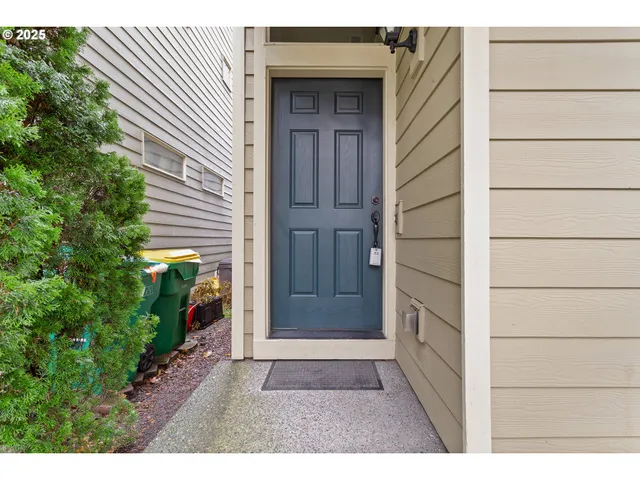 a view of door and wooden wall