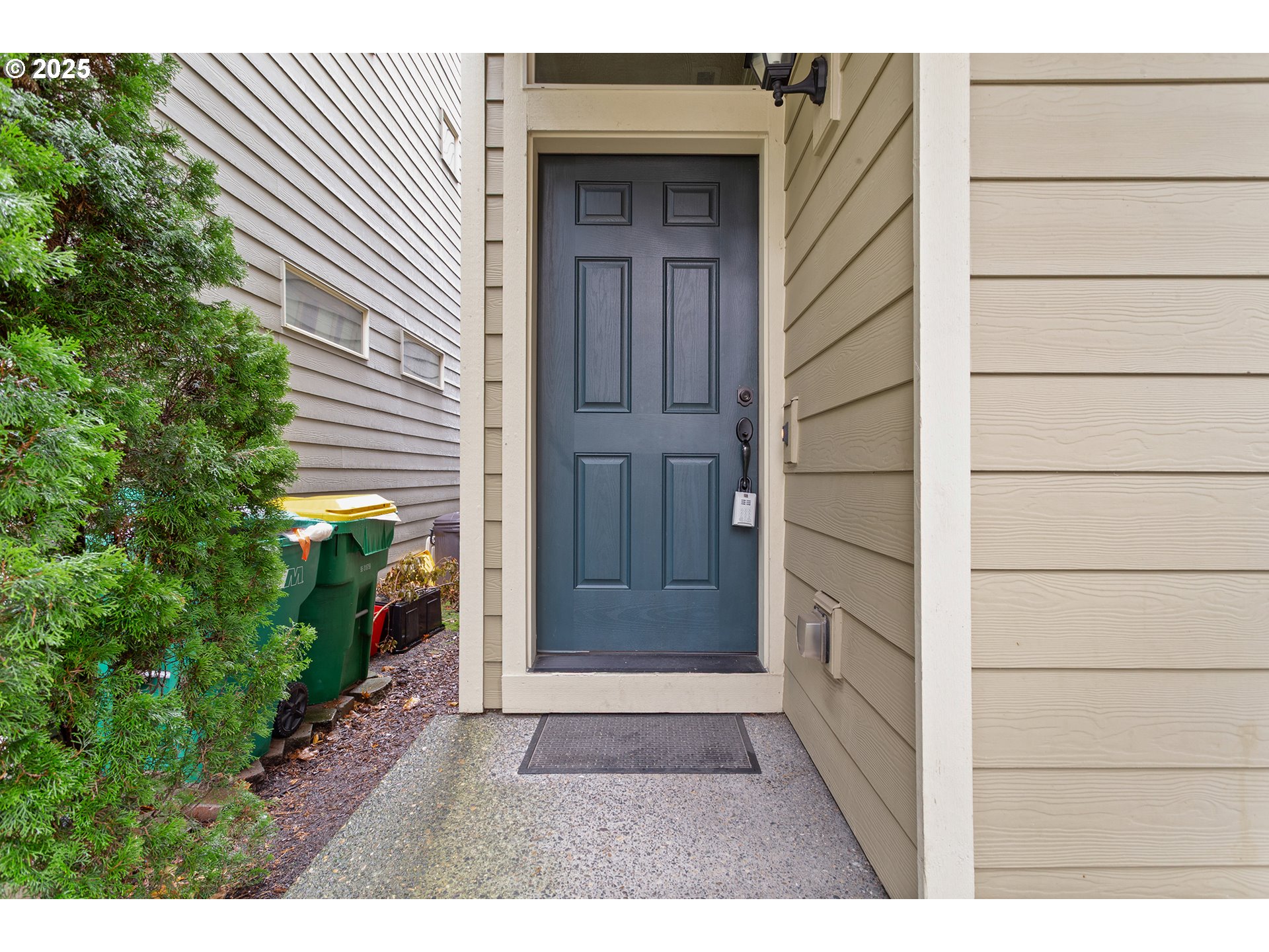 17515 Southwest Vanguard Lane Beaverton, OR 97007 - Photo 2 of 34 a view of door and wooden wall