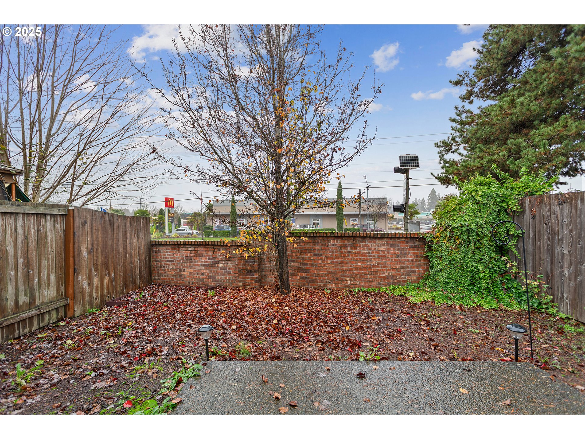 17515 Southwest Vanguard Lane Beaverton, OR 97007 - Photo 34 of 34 a view of backyard with wooden fence