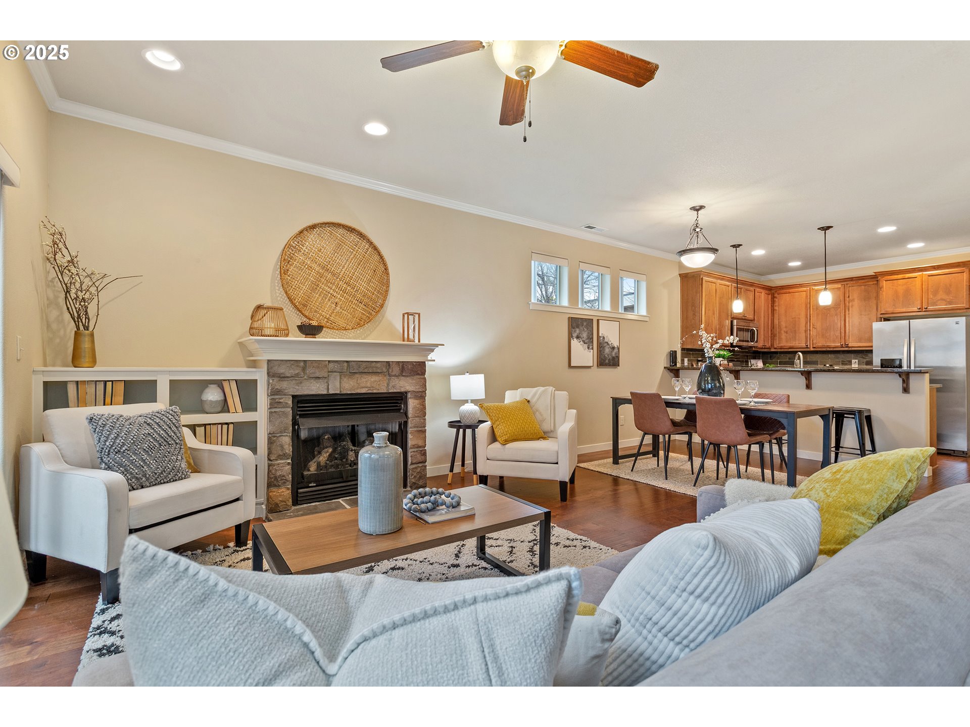 17515 Southwest Vanguard Lane Beaverton, OR 97007 - Photo 9 of 34 a living room with furniture and a fireplace