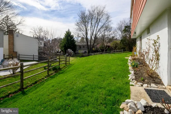 a view of a park with large trees