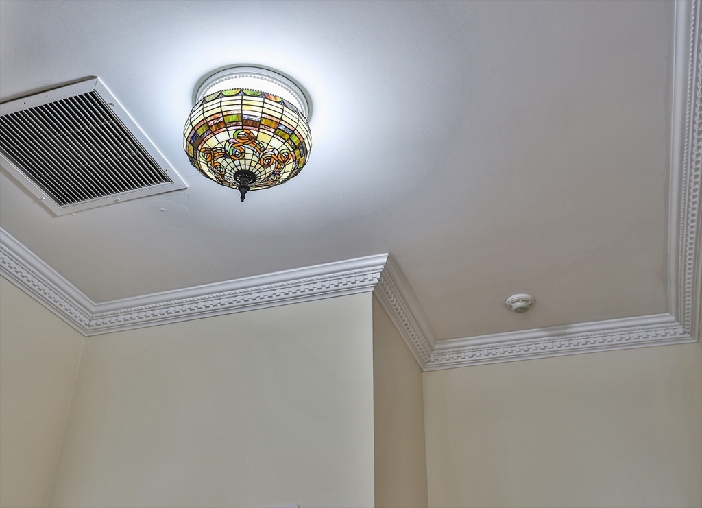 21 South Street, Unit 31 Westborough, MA 01581 - Photo 18 of 19 a view of small space with racks on the wall