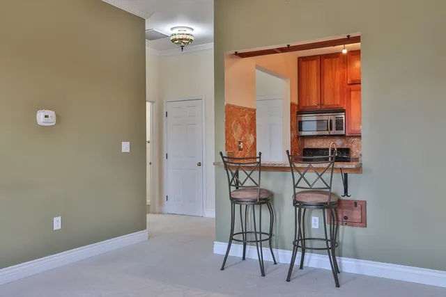 a view of kitchen with furniture