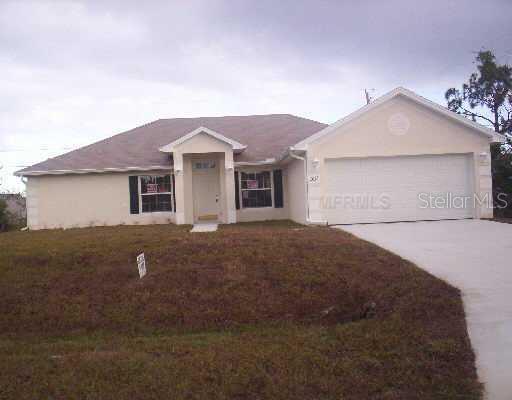 551 Southwest Rabbit Avenue Port St. Lucie, FL 34953 - Photo 1 of 1 Exterior Front
