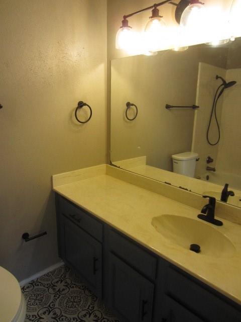 4262 Madera Road Irving, TX 75038 - Photo 13 of 15 a bathroom with a sink and a mirror