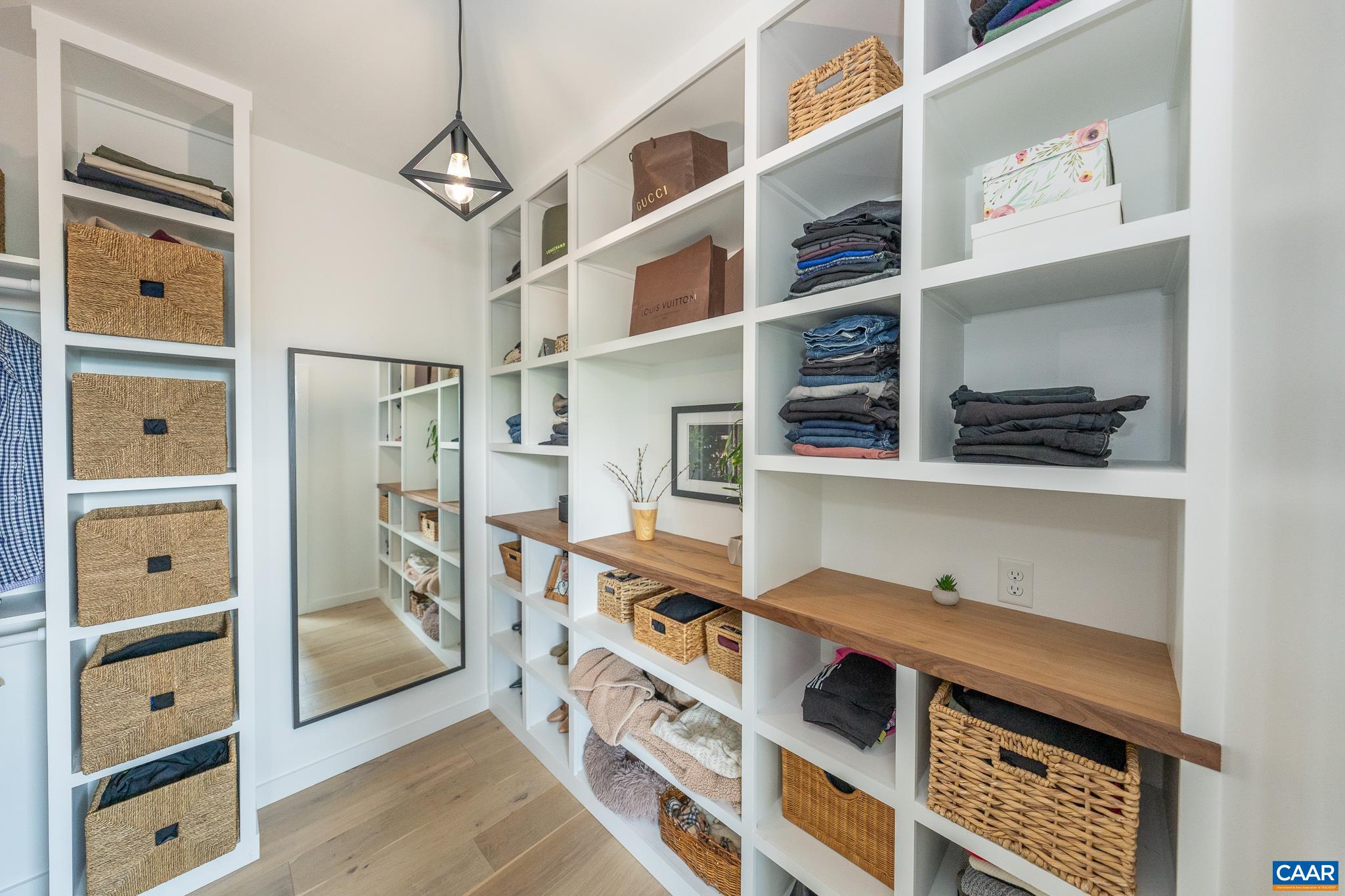 809 Gilliams Mountain Road Charlottesville, VA 22903 - Photo 42 of 68 a view of walk in closet with clothes and shoes