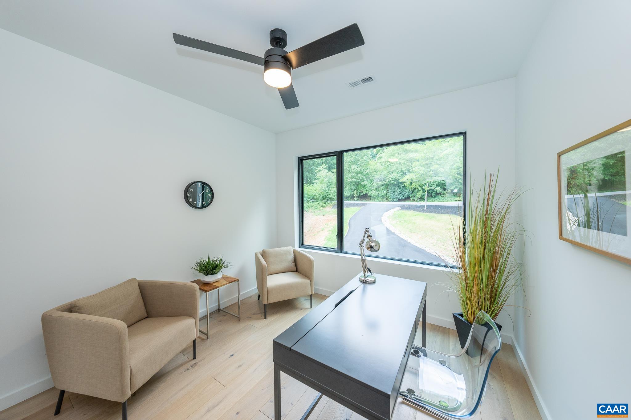 809 Gilliams Mountain Road Charlottesville, VA 22903 - Photo 45 of 68 a living room with furniture and a large window