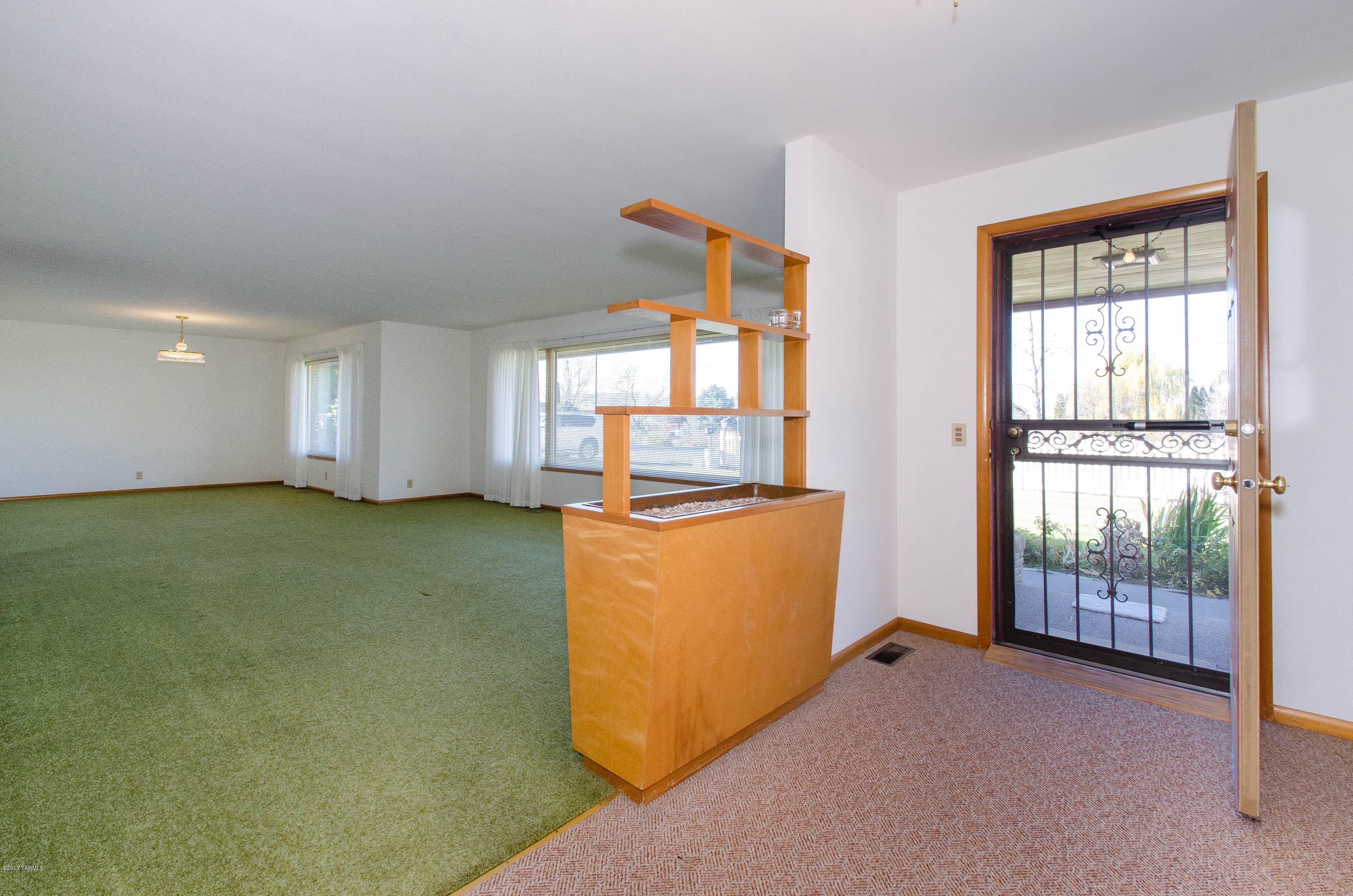 3591 Harrah Road Harrah, WA 98933 - Photo 2 of 20 a view of an empty room with a window