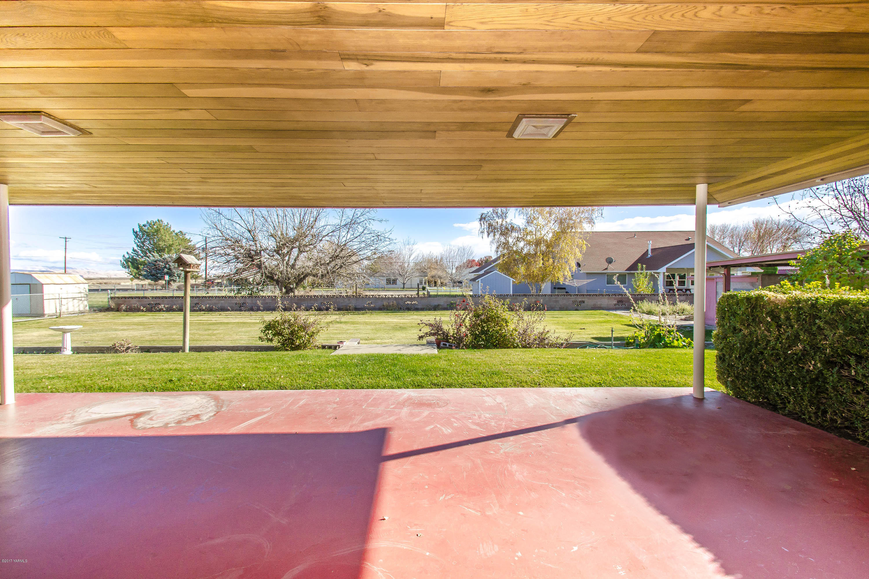 3591 Harrah Road Harrah, WA 98933 - Photo 16 of 20 a view of swimming pool with an outdoor space and seating area