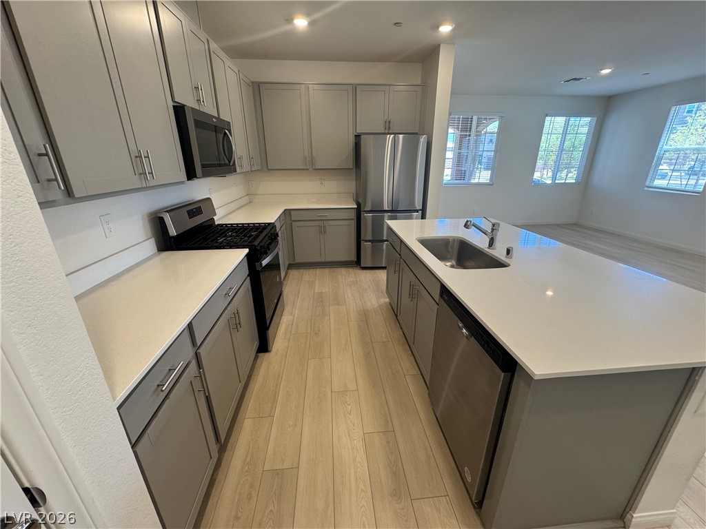 2821 Alcobaca Street Henderson, NV 89044 - Photo 5 of 24 Culinary creations come to life in this modern kitchen with extensive counter space and all new appliances.