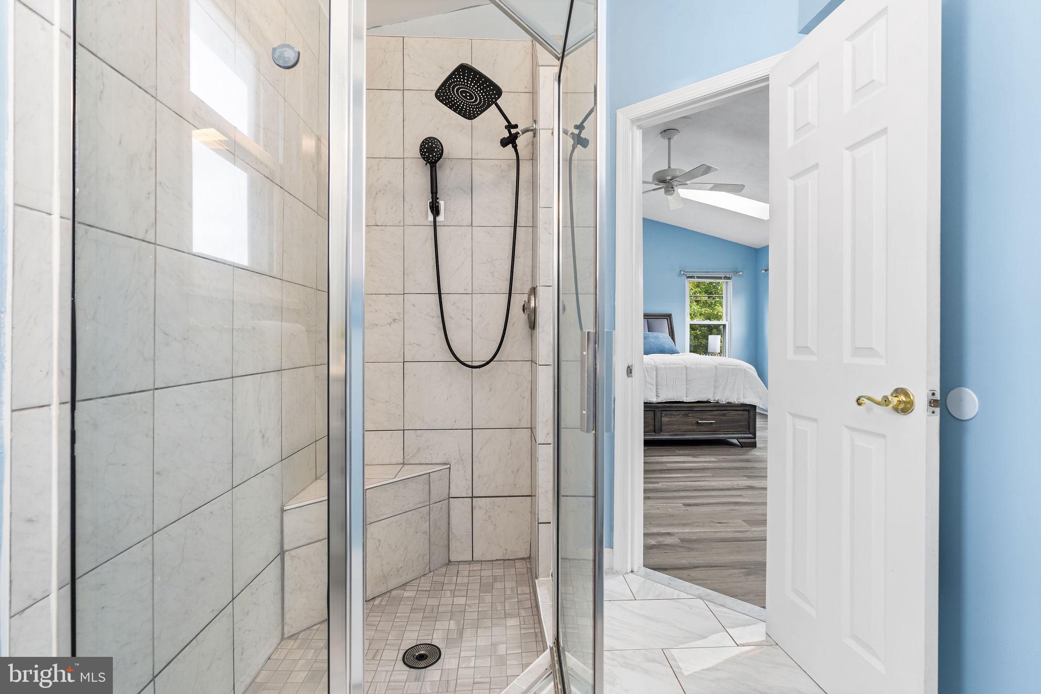 313 Park Hall South Laurel, MD 20724 - Photo 14 of 30 a bathroom with a glass shower door