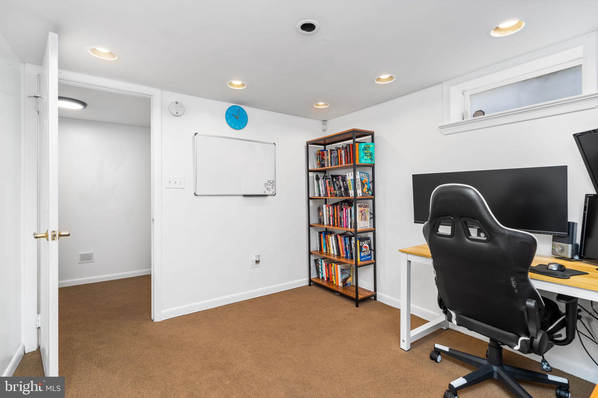 313 Park Hall South Laurel, MD 20724 - Photo 26 of 30 a workspace with furniture and bathroom