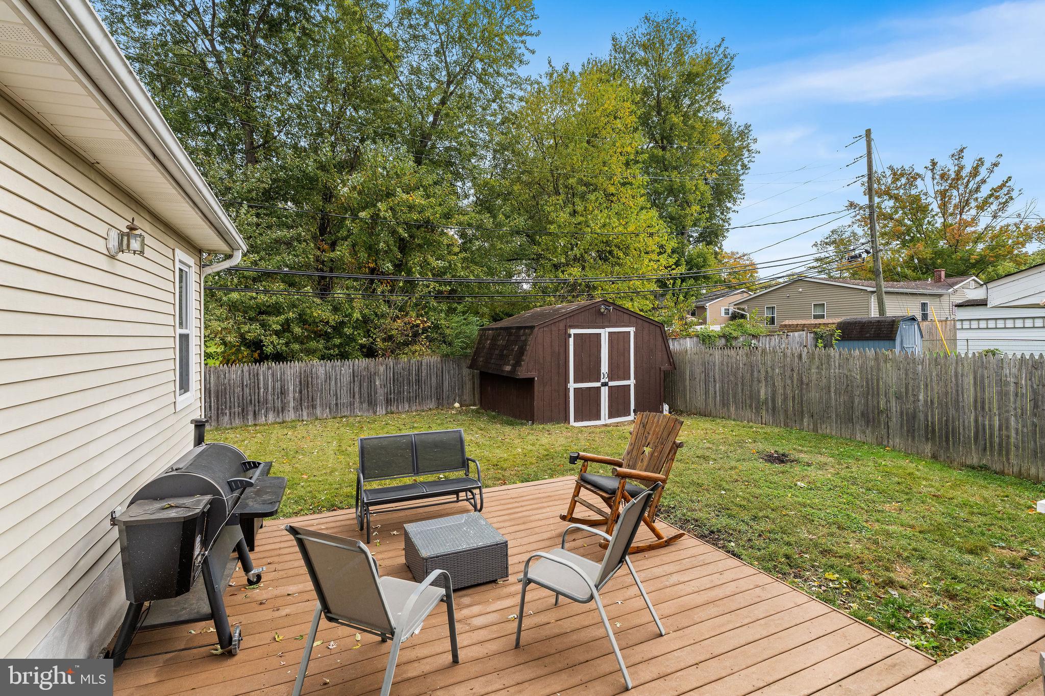 313 Park Hall South Laurel, MD 20724 - Photo 28 of 30 a view of a chairs and table on the deck