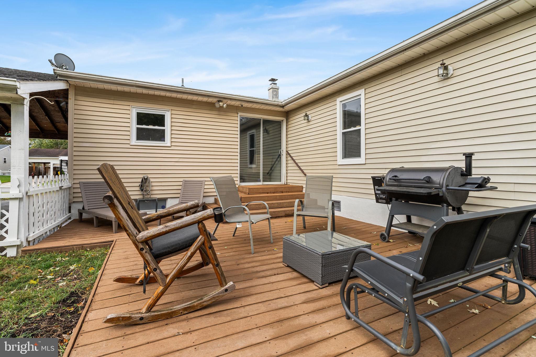 313 Park Hall South Laurel, MD 20724 - Photo 30 of 30 a backyard of a house with outdoor seating