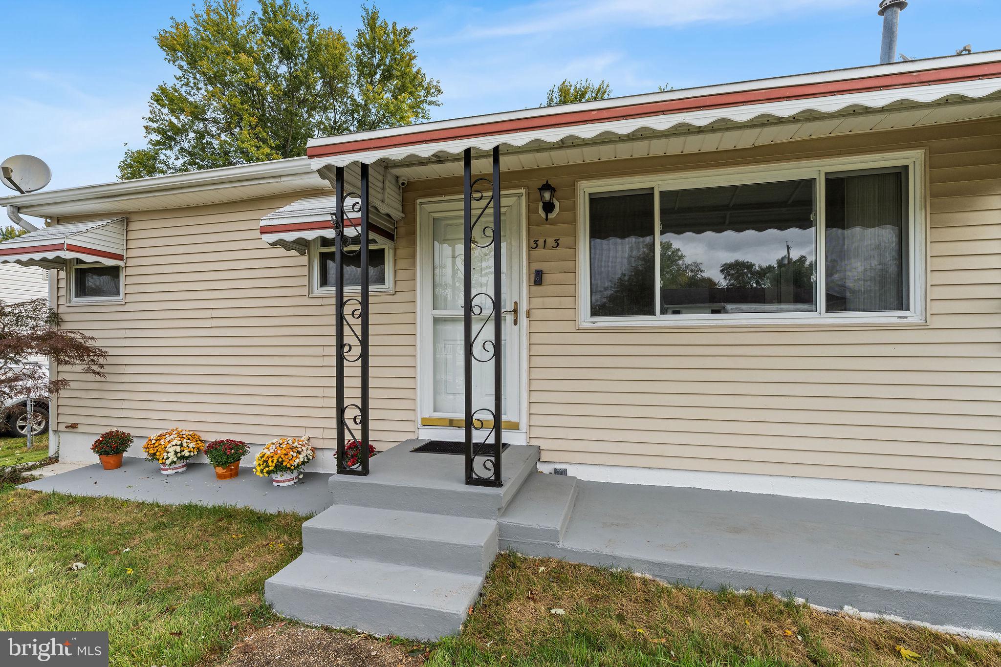 313 Park Hall South Laurel, MD 20724 - Photo 3 of 30 a view of a house with backyard and porch