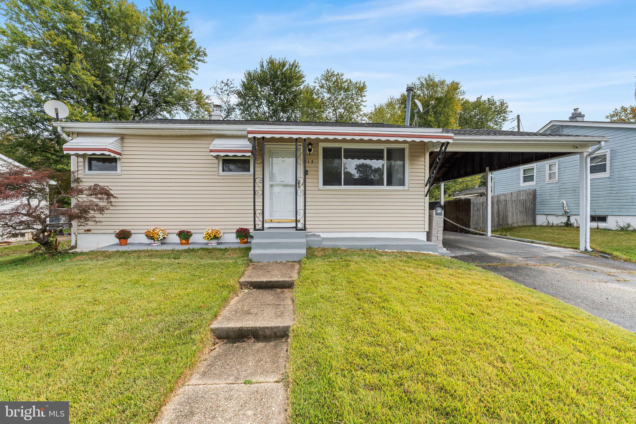 313 Park Hall South Laurel, MD 20724 - Photo 4 of 30 a front view of house with yard and swimming pool