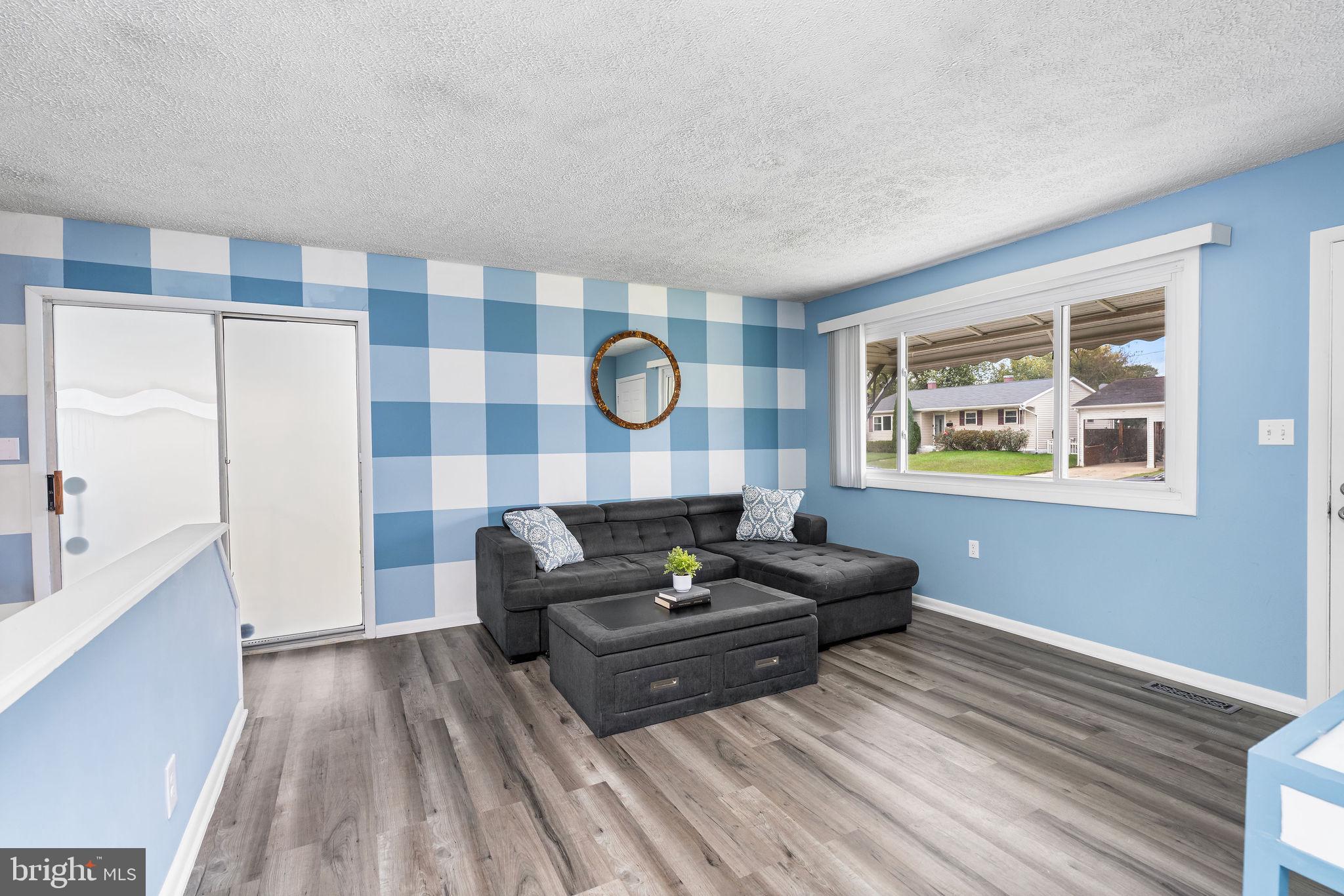 313 Park Hall South Laurel, MD 20724 - Photo 7 of 30 a living room with furniture and wooden floor