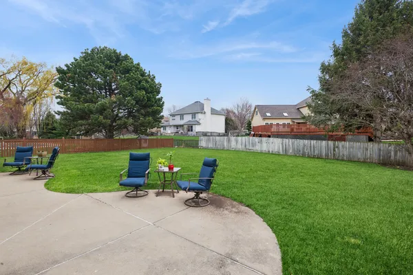 a view of garden with outdoor seating