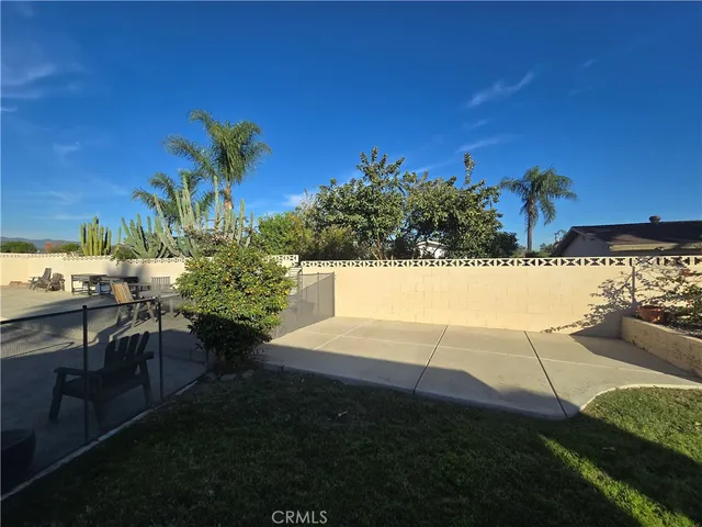 a view of balcony with wooden floor