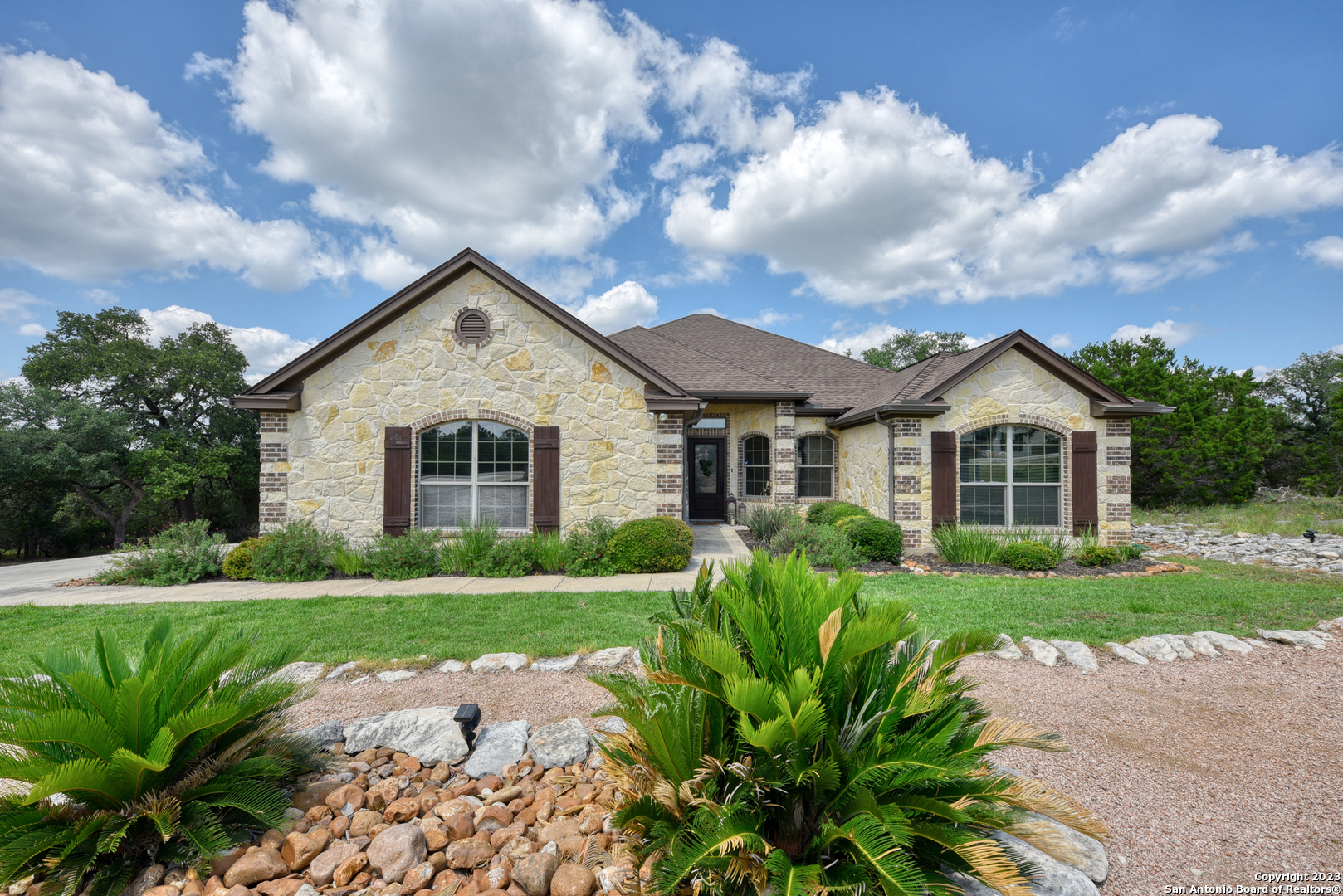 a view of a yard in front of house