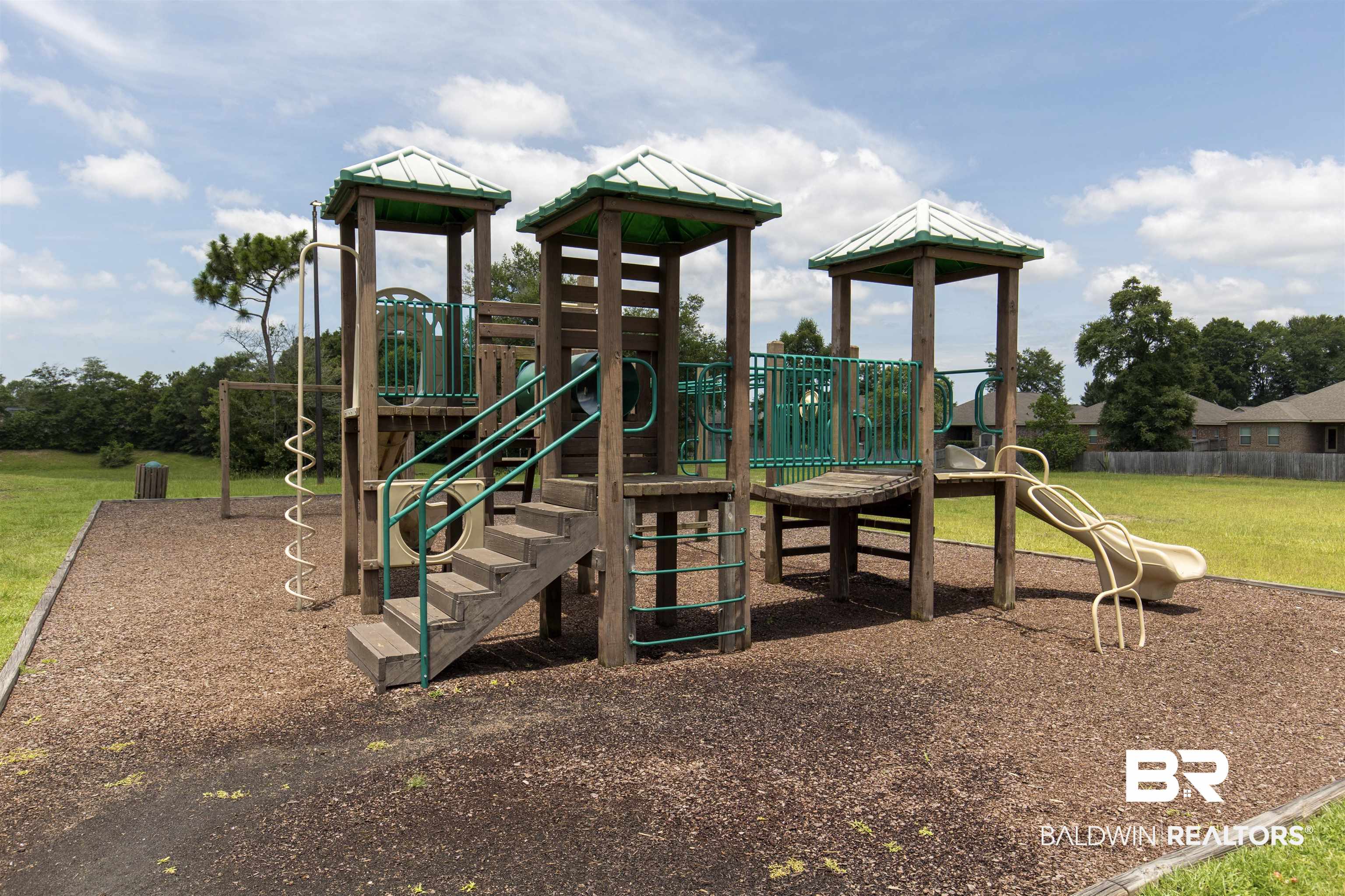2345 Laurel Street Semmes, AL 36575 - Photo 28 of 31 Community playground featuring a lawn