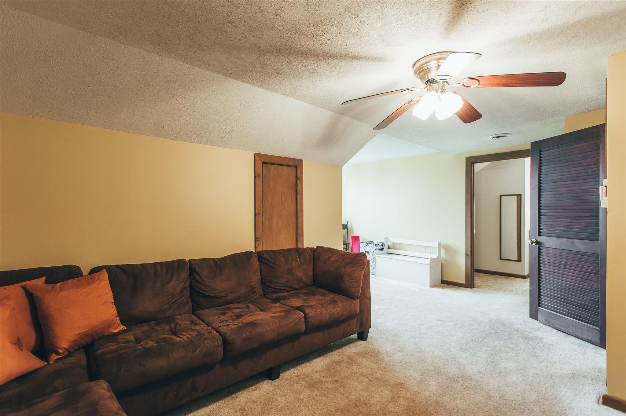 498 Canoe Branch Road Castalian Springs, TN 37031 - Photo 20 of 30 a living room with couches and kitchen view
