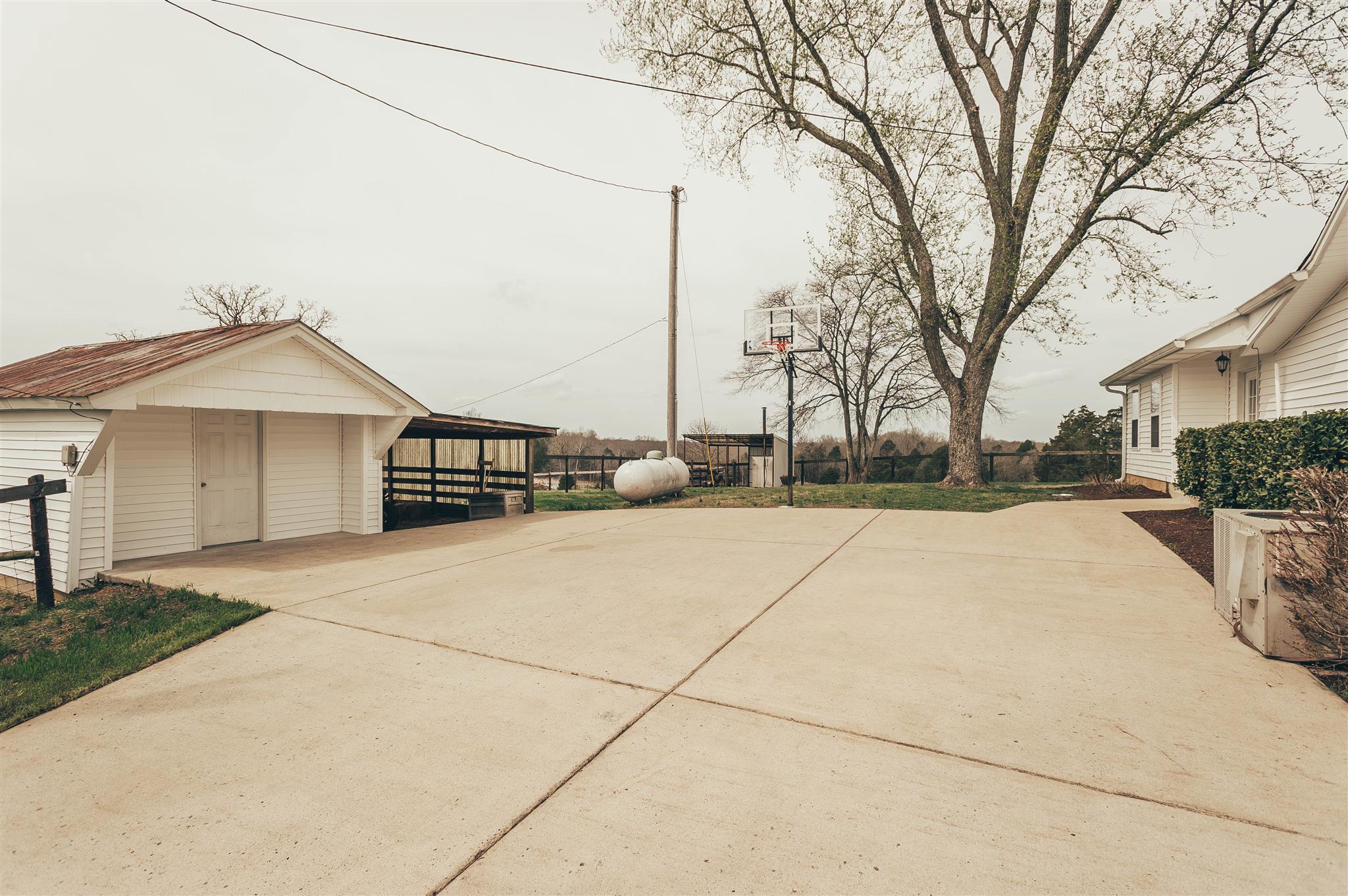 498 Canoe Branch Road Castalian Springs, TN 37031 - Photo 23 of 30 a view of a house with a yard