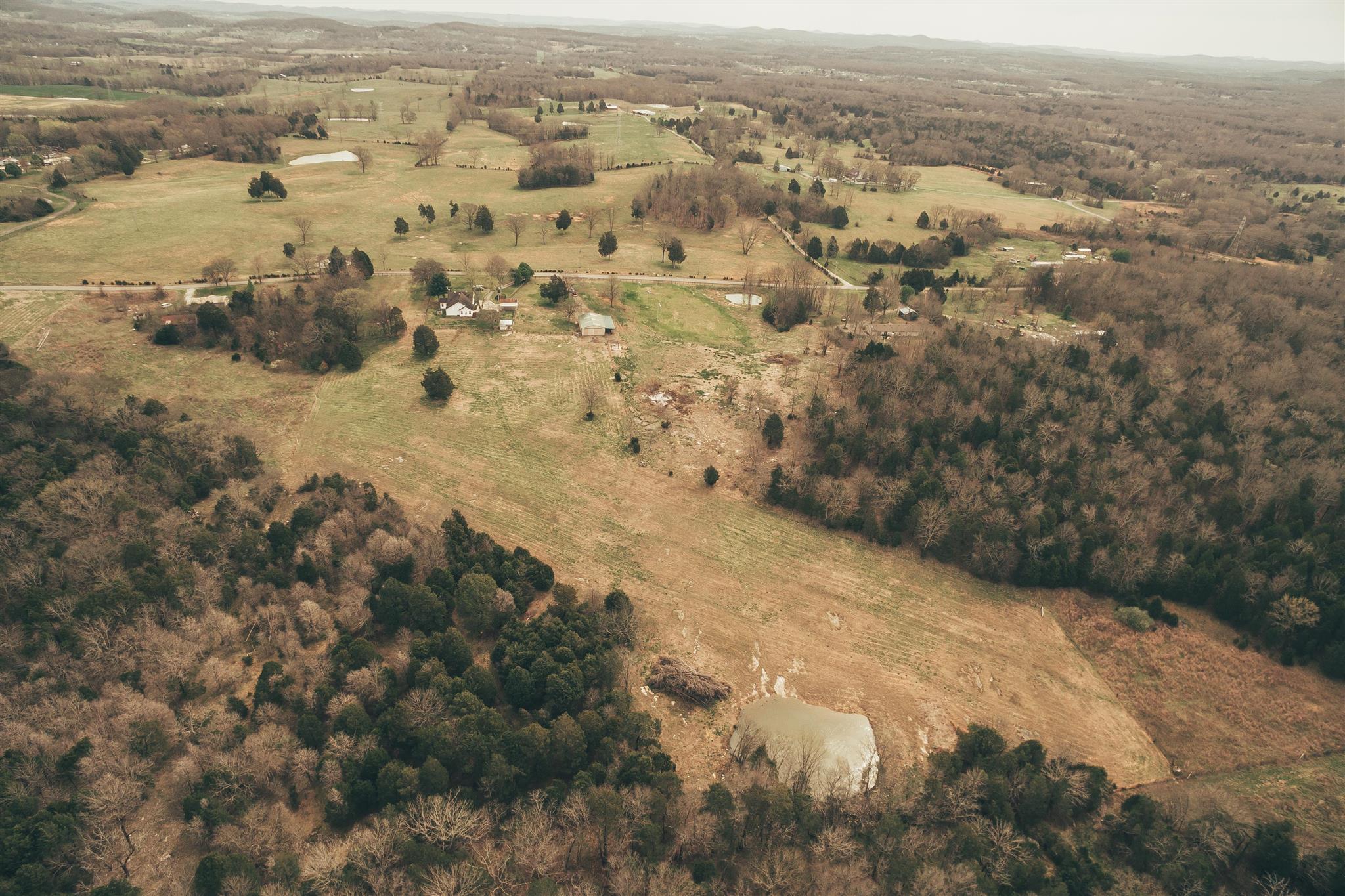 498 Canoe Branch Road Castalian Springs, TN 37031 - Photo 30 of 30 an aerial view of residential houses with outdoor space