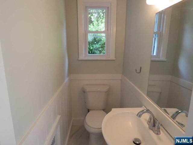 289 Hardenburgh Avenue Demarest, NJ 07627 - Photo 22 of 43 a bathroom with a sink and a toilet