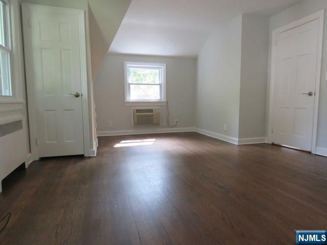 289 Hardenburgh Avenue Demarest, NJ 07627 - Photo 29 of 43 an empty room with wooden floor and windows