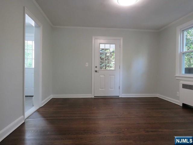 289 Hardenburgh Avenue Demarest, NJ 07627 - Photo 9 of 43 an empty room with wooden floor and windows