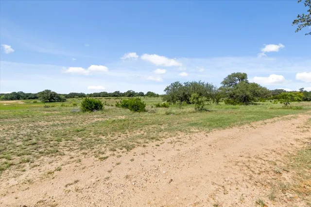 a view of a lake with beach