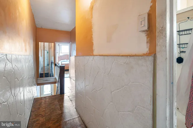 a view of a hallway with windows