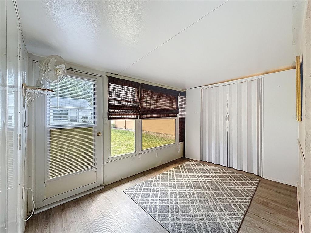 11832 Boynton Lane, Unit 24B New Port Richey, FL 34654 - Photo 25 of 42 an empty room with windows