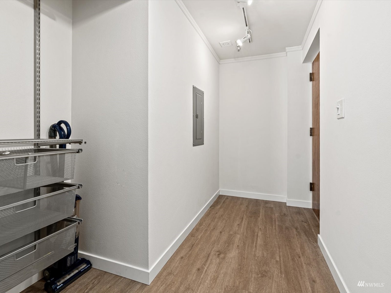 1300 University Street, Unit 2C Seattle, WA 98101 - Photo 14 of 20 a view of a hallway with closet