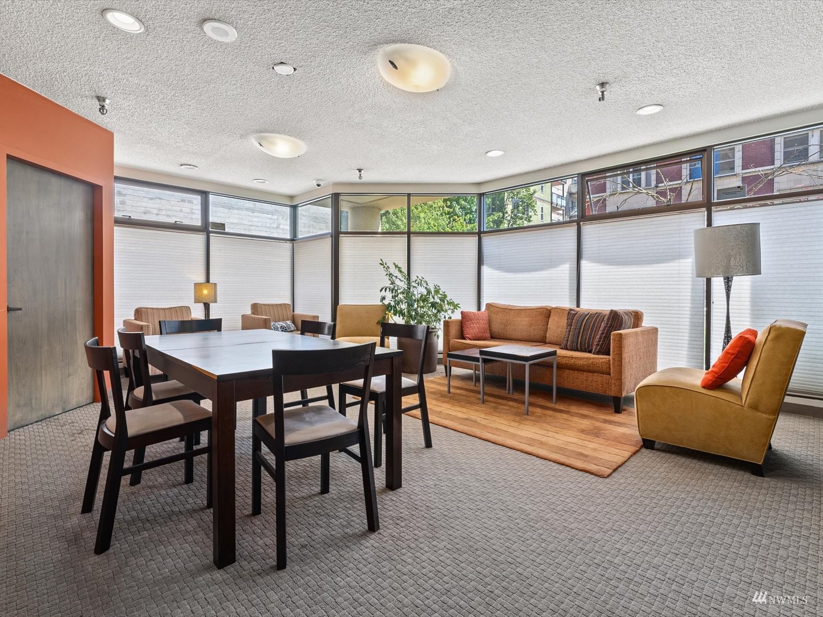 1300 University Street, Unit 2C Seattle, WA 98101 - Photo 19 of 20 a outdoor space with furniture a window and a projector