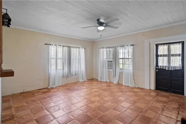 a big room with windows and closet