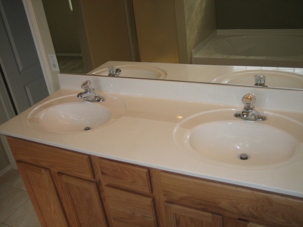 6912 West Carson Road Laveen, AZ 85339 - Photo 14 of 24 a bathroom with a sink and a tub