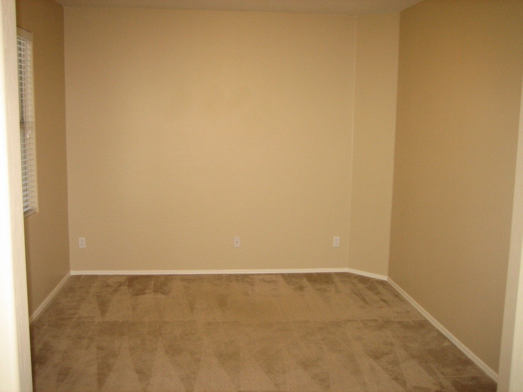 6912 West Carson Road Laveen, AZ 85339 - Photo 17 of 24 a view of an empty room