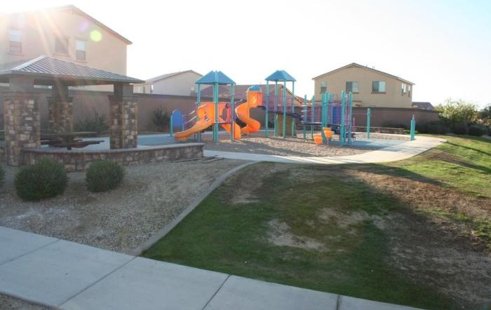 6912 West Carson Road Laveen, AZ 85339 - Photo 23 of 24 a view of a house with a yard and a garden