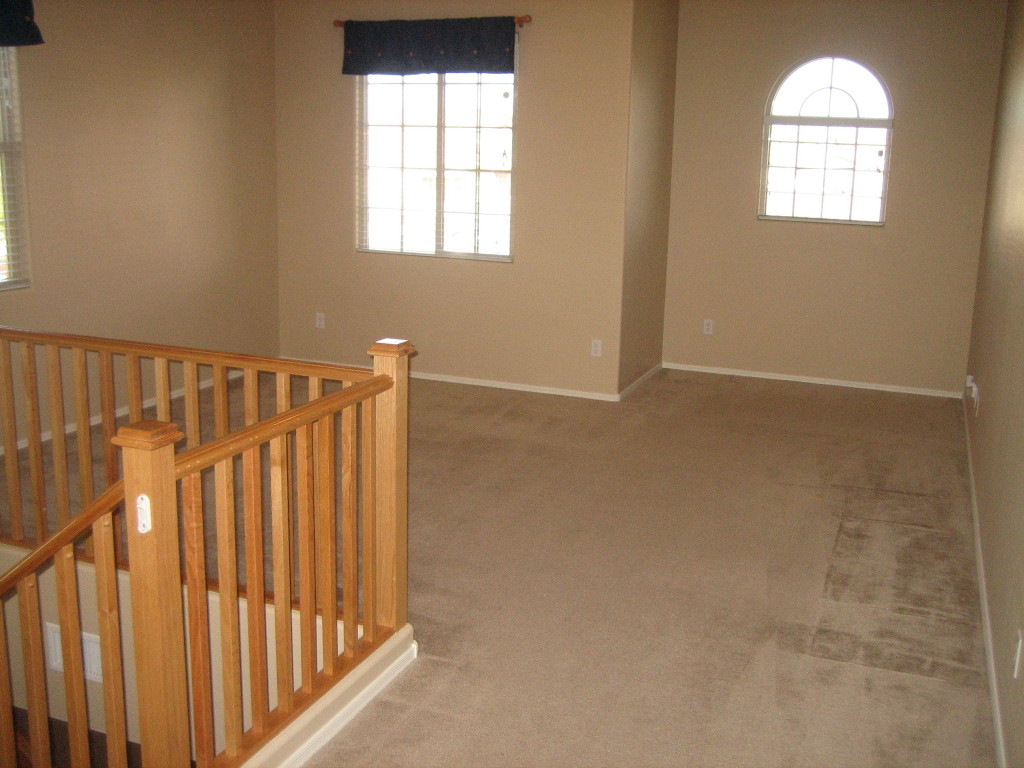 6912 West Carson Road Laveen, AZ 85339 - Photo 5 of 24 a view of entryway with wooden floor