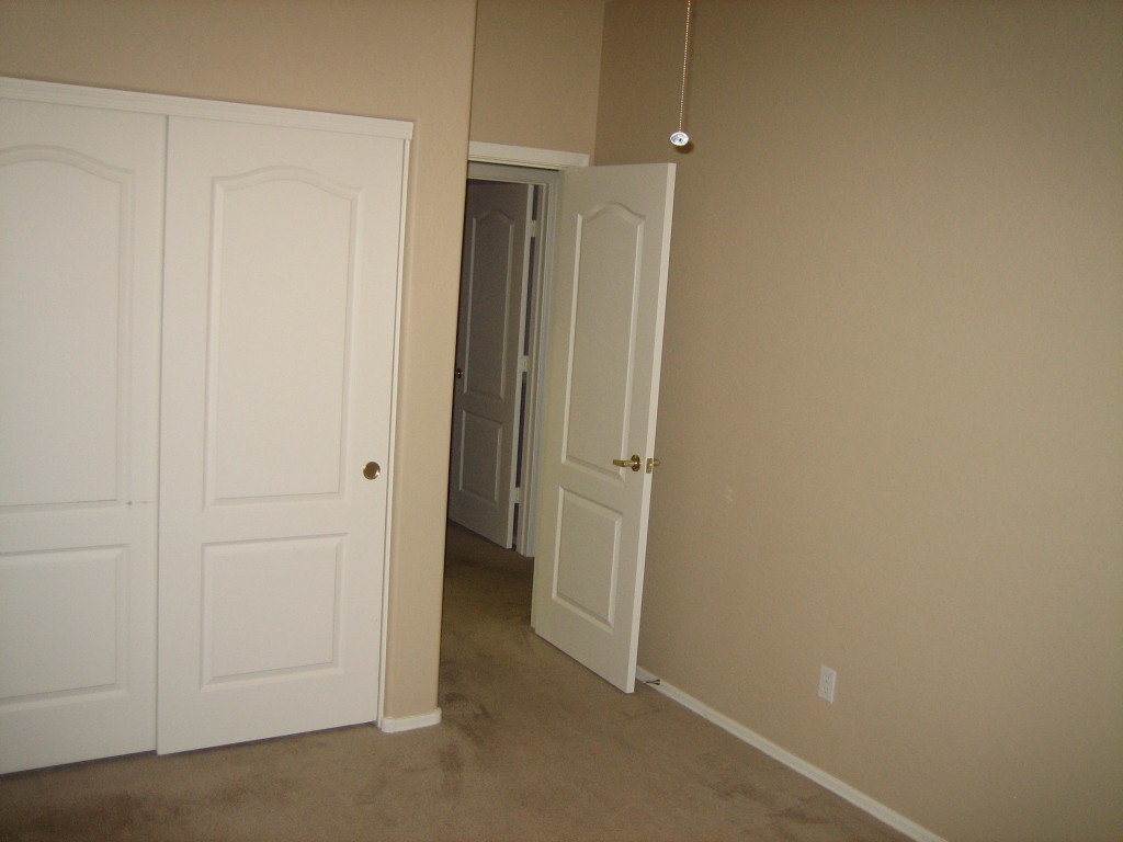 6912 West Carson Road Laveen, AZ 85339 - Photo 10 of 24 an empty room with closet