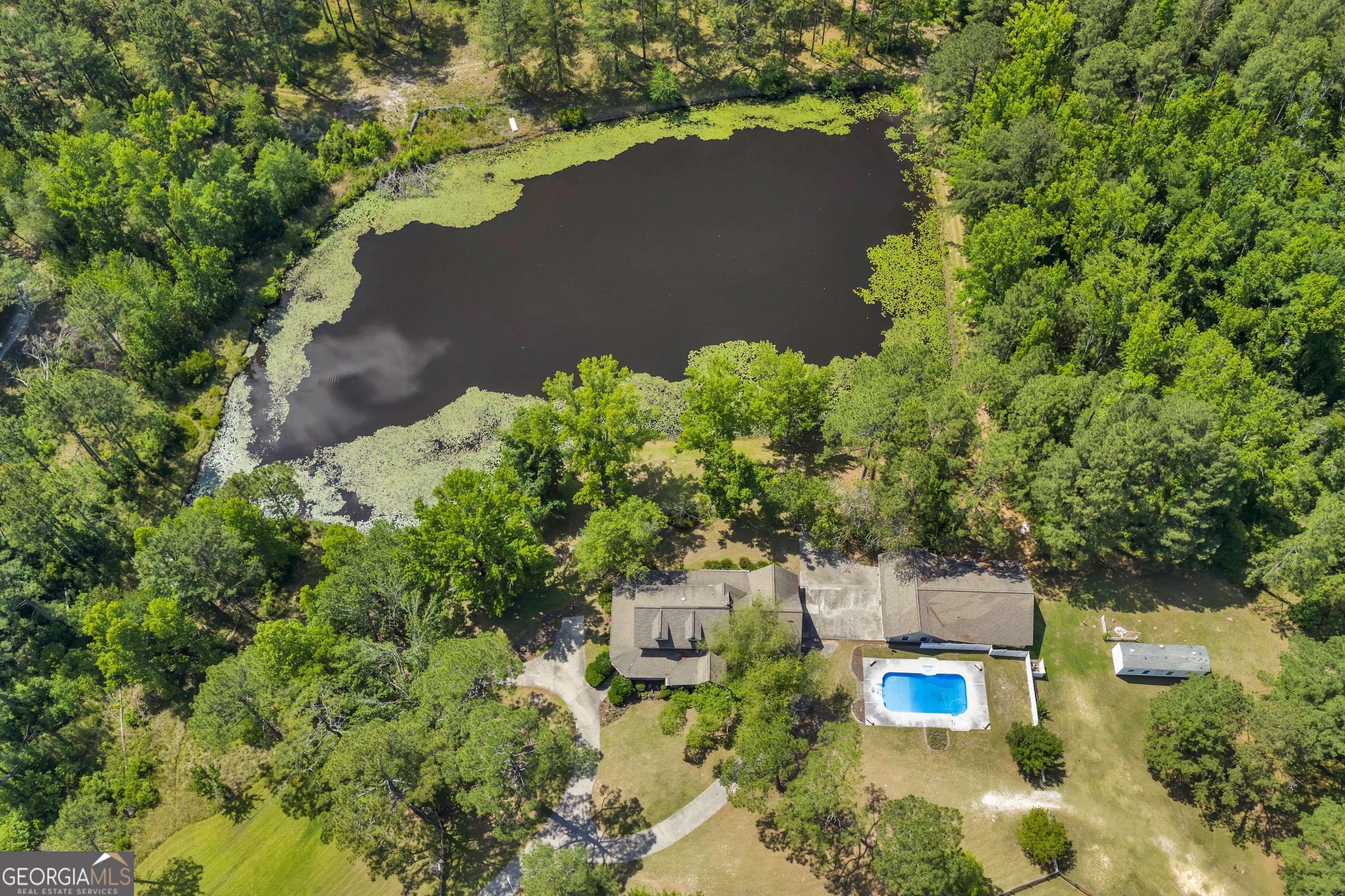 87 Georgia Avenue Adrian, GA 31002 - Photo 13 of 74 an aerial view of a house with a yard
