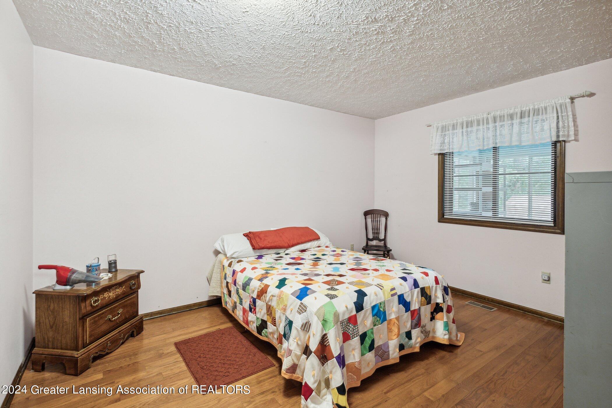 6291 Ridge Street Haslett, MI 48840 - Photo 14 of 31 1st Floor Bedroom